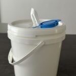 Refillable Plastic Bucket for Industrial Wipes This durable plastic bucket is designed to hold dry rolls of wipes, which can be soaked with your own cleaning or disinfectant solution to create industrial wet wipes. The refillable design ensures cost savings and flexibility, while the sealed lid keeps wipes fresh and ready for use. Ideal for factories, workshops, automotive, and maintenance industries.